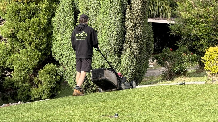 Photo of Stuart on the mower